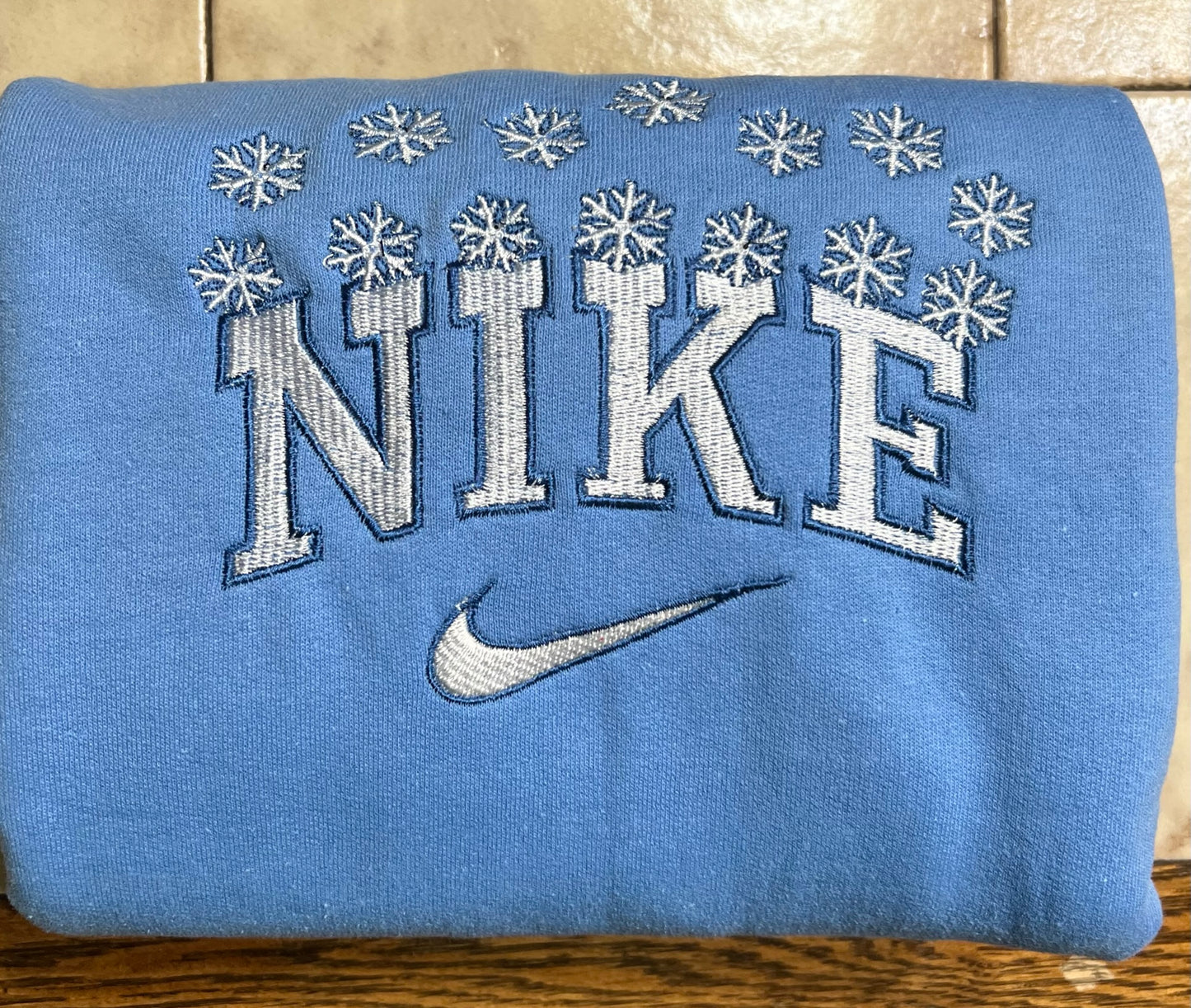 Snowflake N K E Sweatshirt