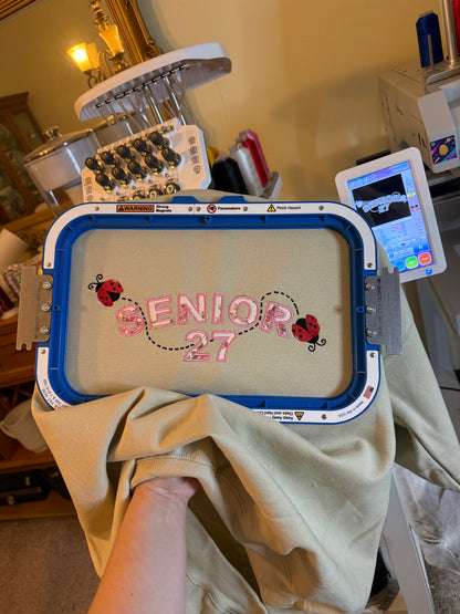 Senior Lady Bug Appliqúe Sweatshirt